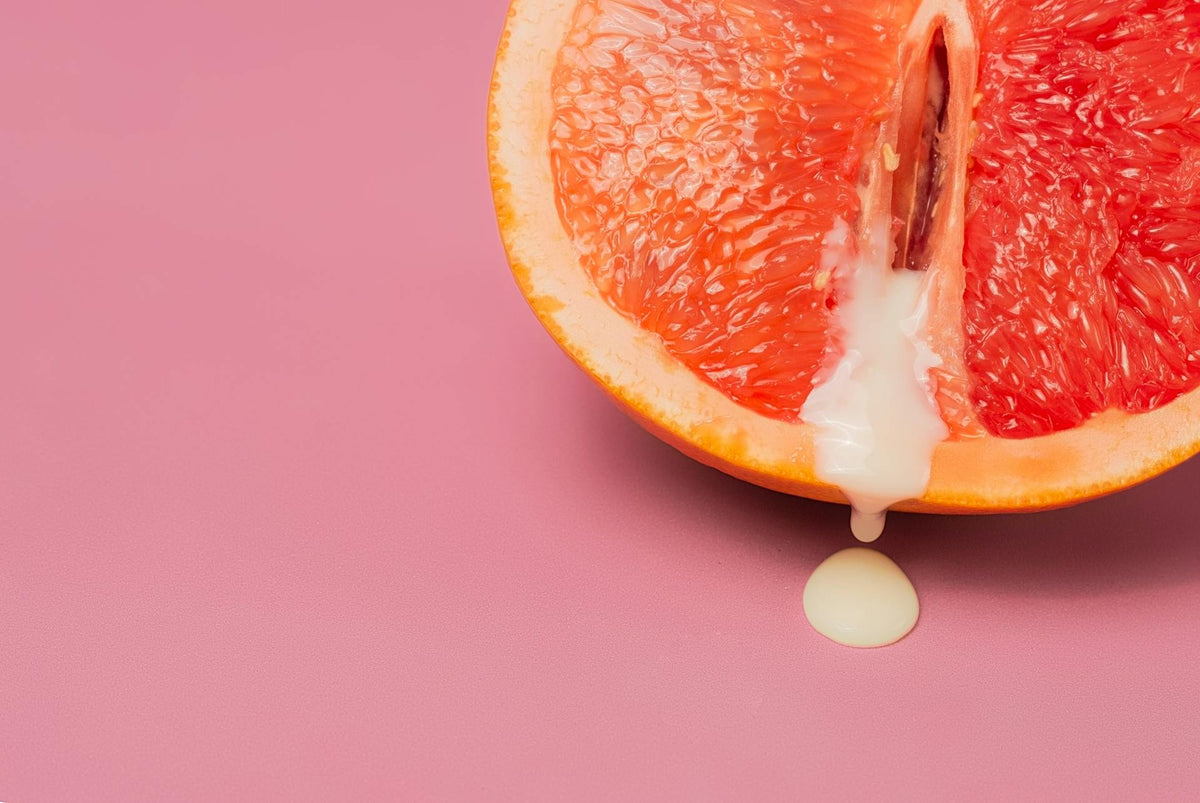 Sex Stories A halved grapefruit oozing white juice.