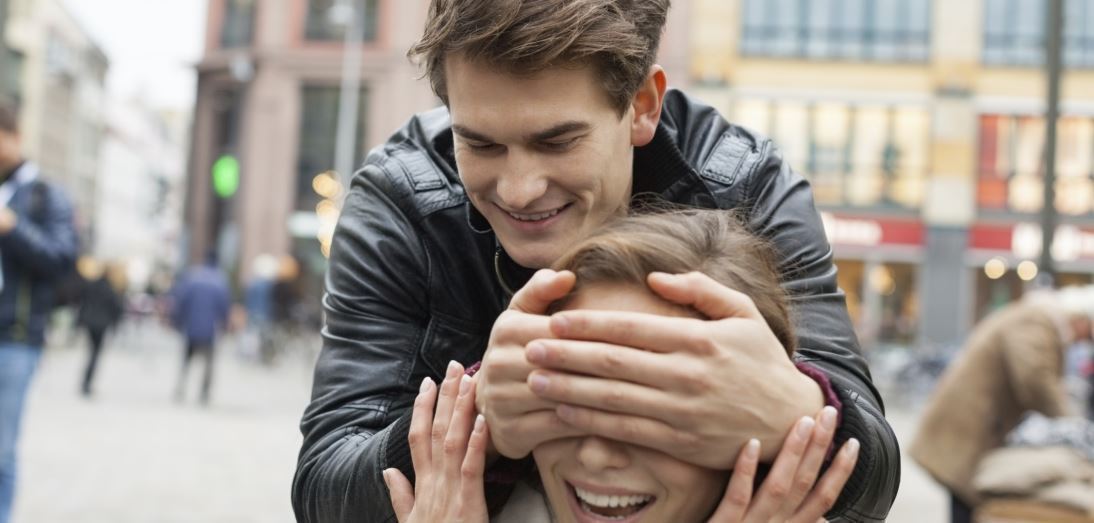 Sex Stories a man blindfolding a woman