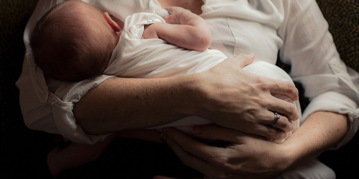 Sex Stories Woman breastfeeding her baby