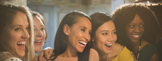 Group of womens laughing.