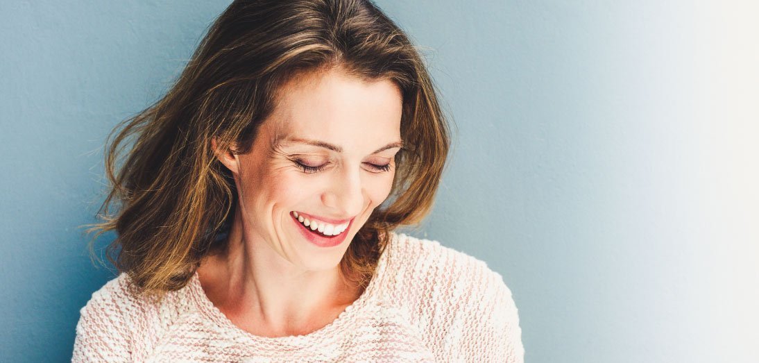 laughing woman during menopause